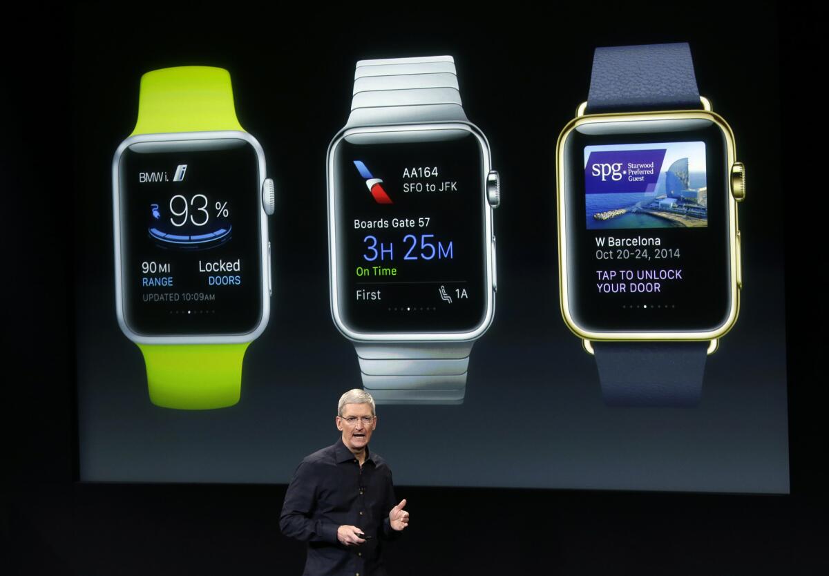 Apple CEO Tim Cook discusses the new Apple Watch during an event at Apple headquarters.