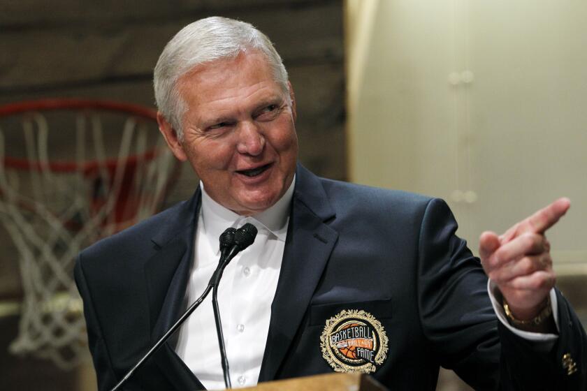 FILE - Basketball Hall of Fame inductee Jerry West, representing the 1960 USA Olympic Team, speaks during the enshrinement news conference at the Hall of Fame Museum in Springfield, Mass. Friday, Aug. 13, 2010. Jerry West, who was selected to the Basketball Hall of Fame three times in a legendary career as a player and executive and whose silhouette is considered to be the basis of the NBA logo, died Wednesday morning, June 12, 2024, the Los Angeles Clippers announced. He was 86.(AP Photo/Elise Amendola)