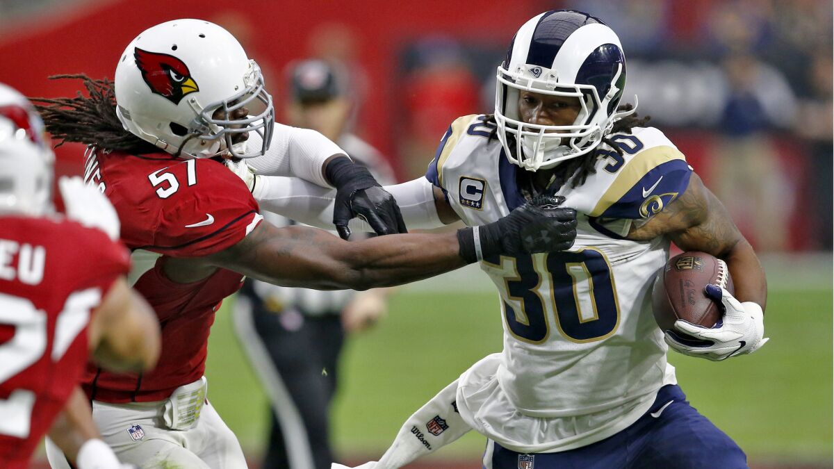 Todd Gurley picks up 158 yards from scrimmage against linebacker Josh Bynes and the Cardinals.