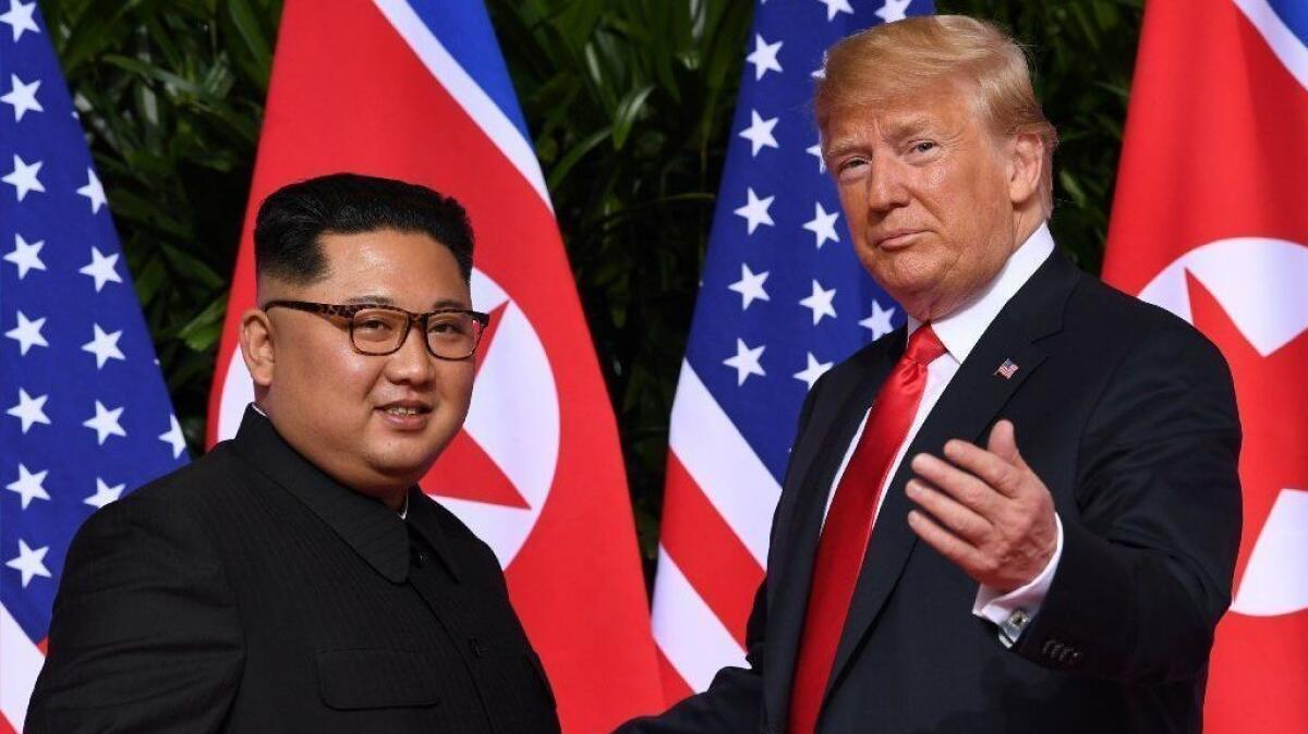 President Trump and North Korean leader Kim Jong Un meet at their first summit in Singapore on June 12, 2018.