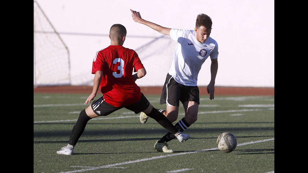 Photo Gallery: Hoover vs. Burroughs in boys soccer