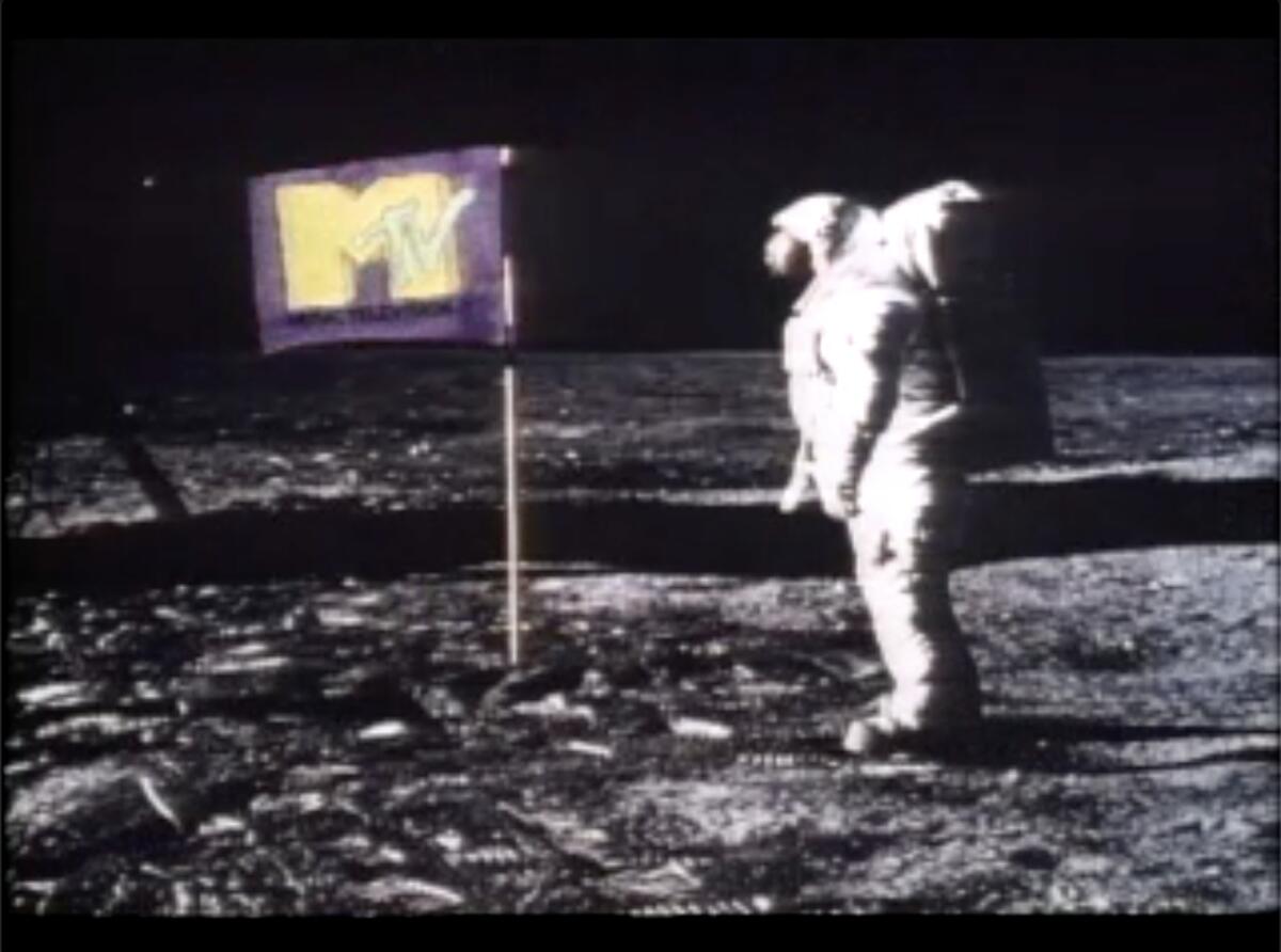 Original MTV image of astronaut plating an MTV flag on the moon. 