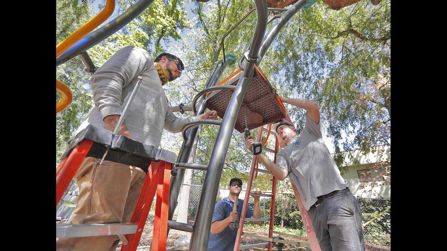 Photo Gallery: Fancy new playground being installed at Carr Park in Glendale