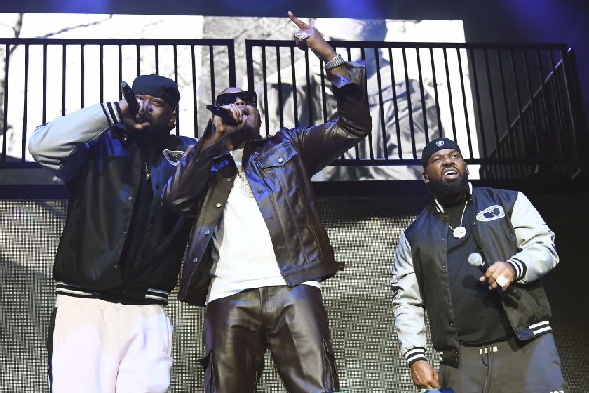 OAKLAND, CALIFORNIA - OCTOBER 01: (L-R) Ghostface Killah, Nas, and Raekwon perform during the "New York State of Mind" tour at Oakland Arena on October 01, 2022 in Oakland, California. (Photo by Tim Mosenfelder/Getty Images)