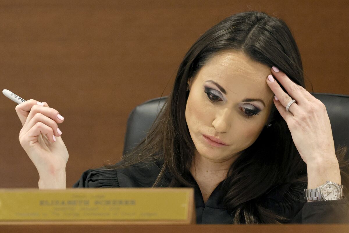 Judge Elizabeth Scherer is shown during jury pre-selection in the penalty phase of the trial of Marjory Stoneman Douglas High School shooter Nikolas Cruz at the Broward County Courthouse in Fort Lauderdale, Fla. on Monday, April 4, 2022. Cruz previously plead guilty to all 17 counts of premeditated murder and 17 counts of attempted murder in the 2018 shootings. (Amy Beth Bennett/South Florida Sun Sentinel via AP, Pool)