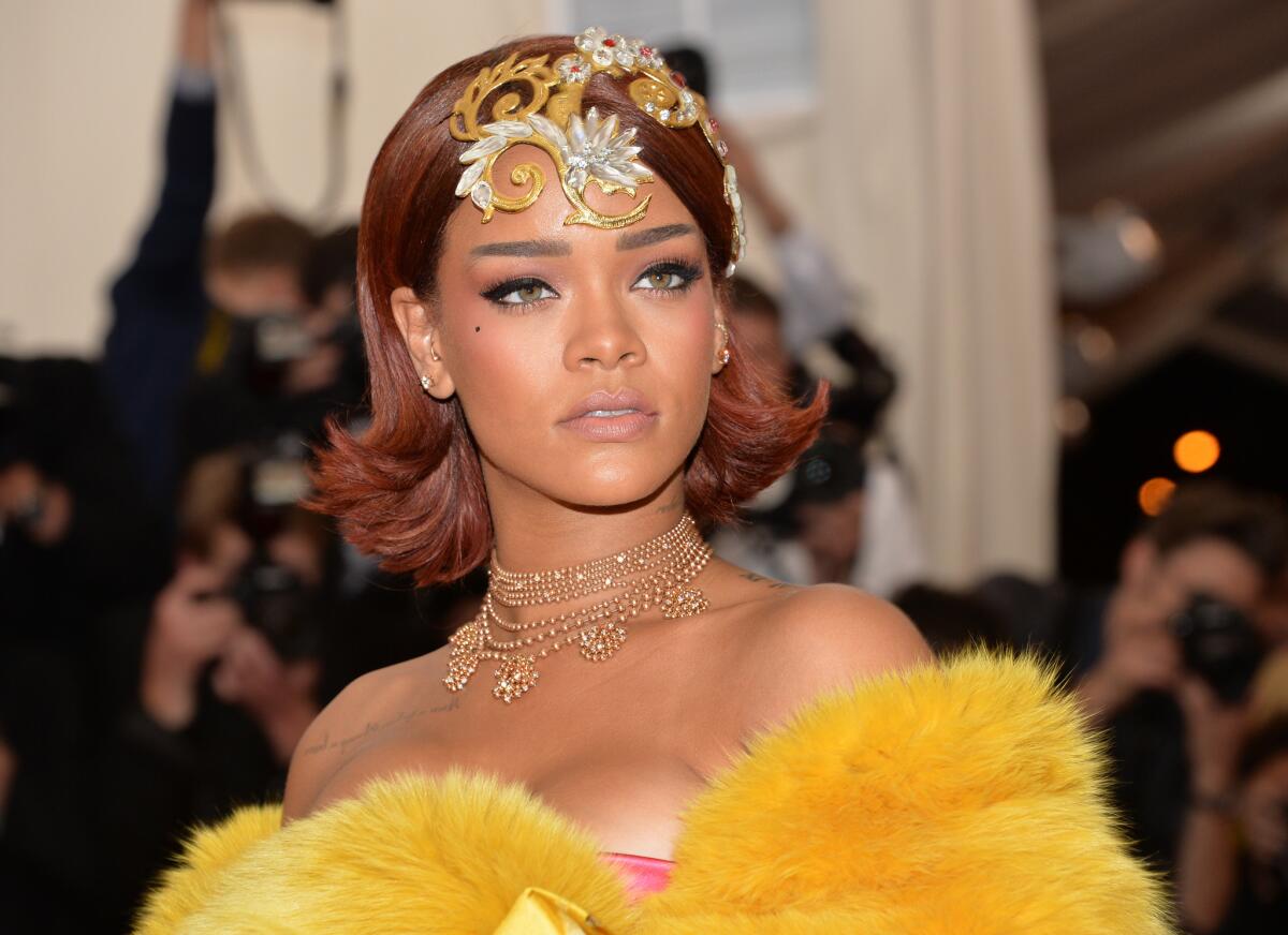 Rihanna, shown at the Metropolitan Museum of Art's Costume Institute benefit gala, will join NBC's "The Voice" this fall.