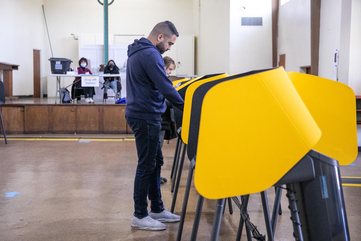 People vote in the City Council District 6 race.