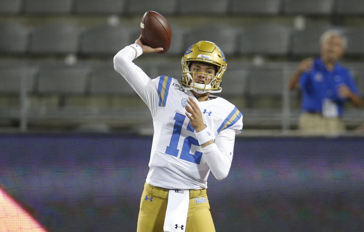 UCLA quarterback Austin Burton passes against Arizona.