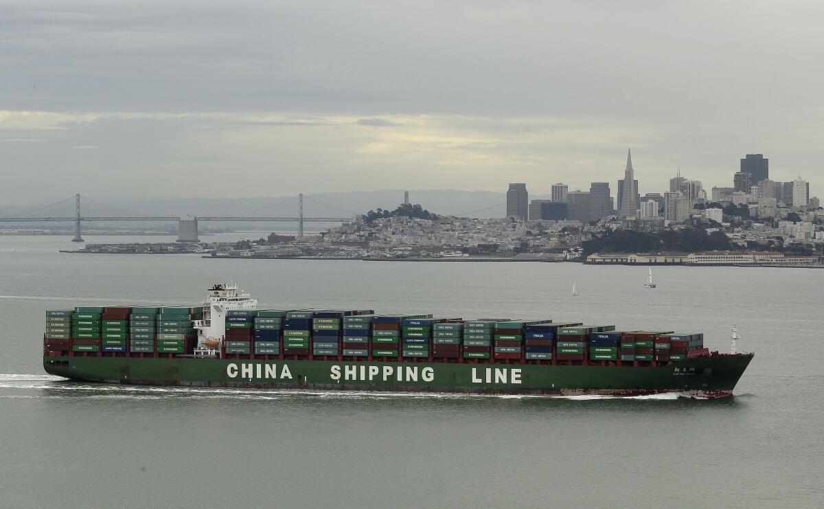 A China Shipping Line container ship with the San Francisco skyline