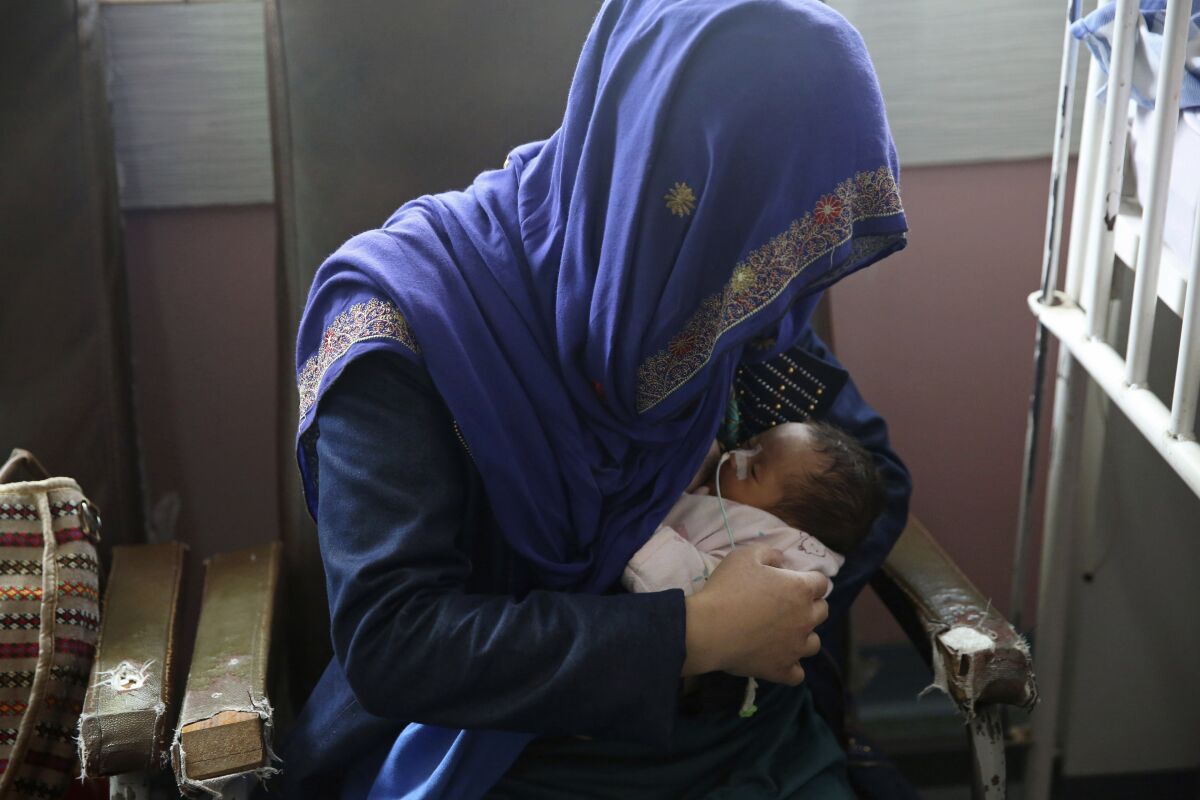 A mother and baby at a hospital in Kabul, Afghanistan