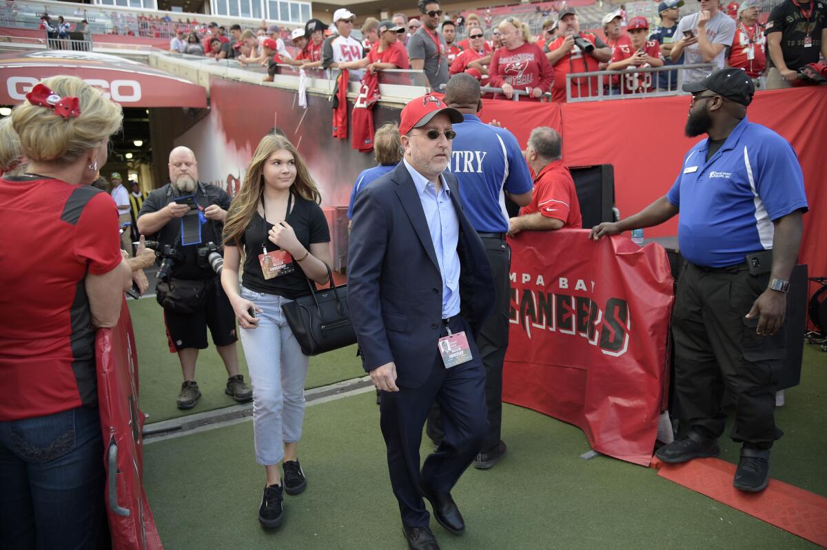 Tampa Bay Buccaneers co-chairman Edward Glazer, right, and his daughter at an NFL game in Tampa, Fla., in 2016.