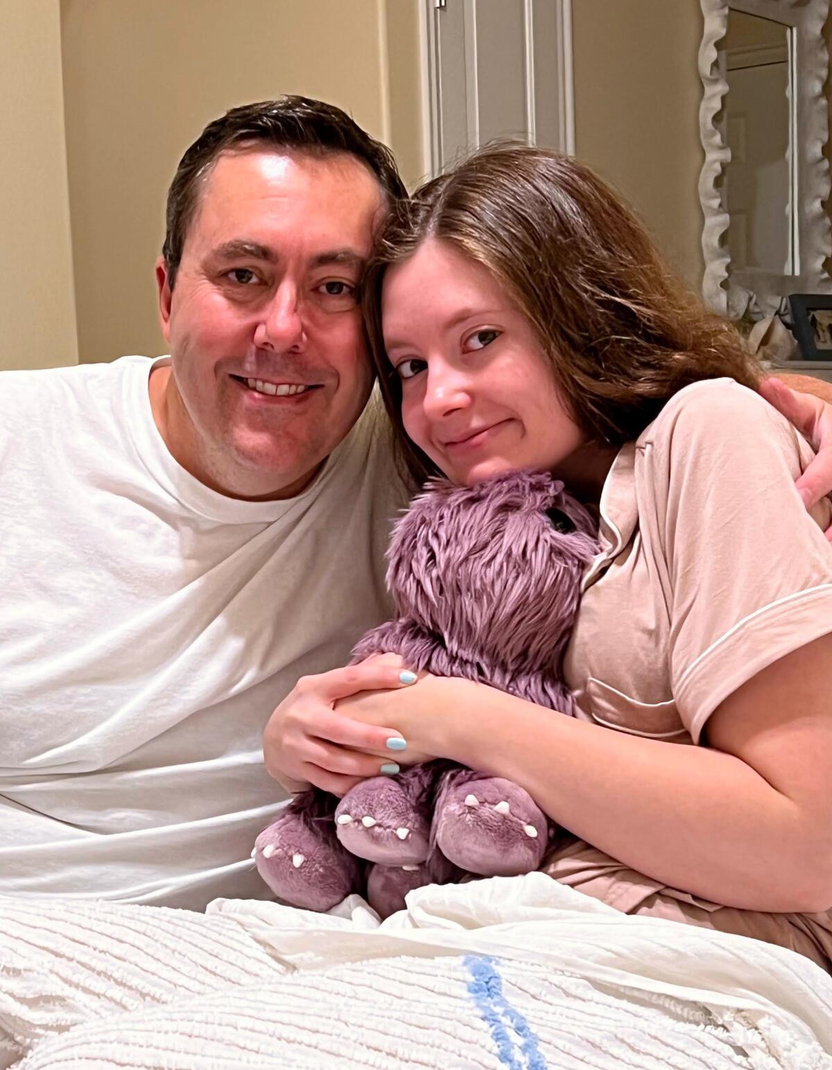 Isabella McDonald with her father, Brent.