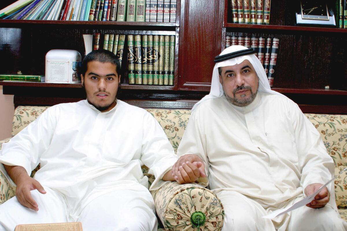 Detainee Fawzi Odah's father Khalid Odah, right, and brother Sulaiman.