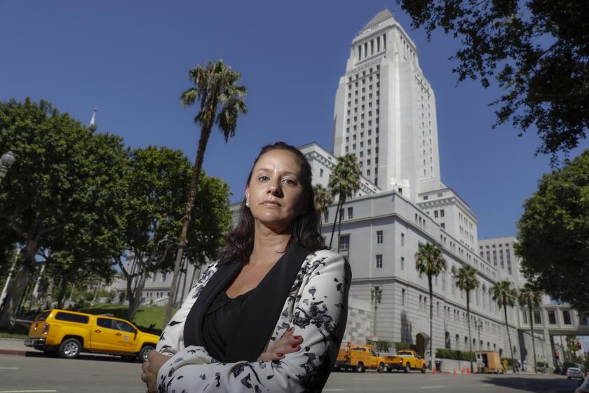 LOS ANGELES, CA - AUGUST 27, 2019 Ñ City auditor Beth Kennedy has filed a claim against the city, alleging that her home was vandalized and the city failed to protect her after she started working on an audit of Department of Water and Power contracts. She claims that her boss warned her not to delve too deeply into the contracts. (Irfan Khan/Los Angeles Times)
