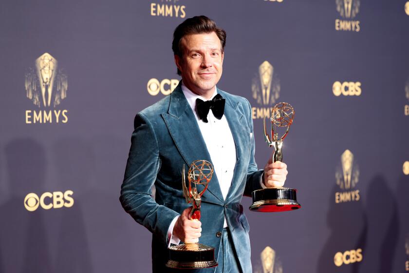LOS ANGELES, CA - SEPTEMBER 19: Jason Sudeikis poses with his Emmy awards on the red carpet during the 73rd Annual Emmy Awards taking place at LA Live on Sunday, Sept. 19, 2021 in Los Angeles, CA. (Jay L. Clendenin / Los Angeles Times)