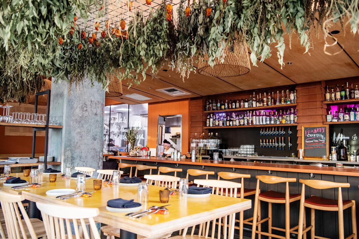 Inside Yapa restaurant, where you'll find herbs drying from above.