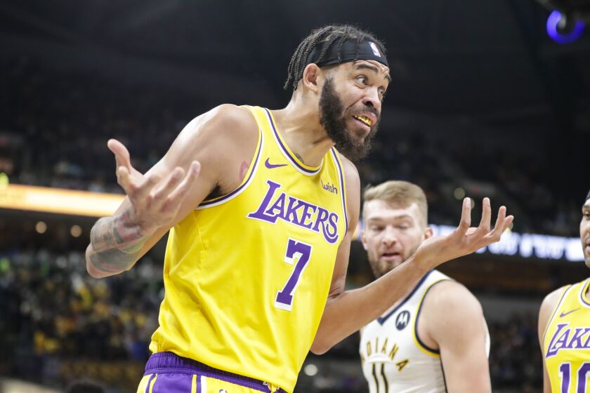 Los Angeles Lakers center JaVale McGee (7) questions fold call during the second half of an NBA basketball game against the Indiana Pacers in Indianapolis, Tuesday, Dec. 17, 2019. The Pacers defeated the Lakers 105-102. (AP Photo/Michael Conroy)