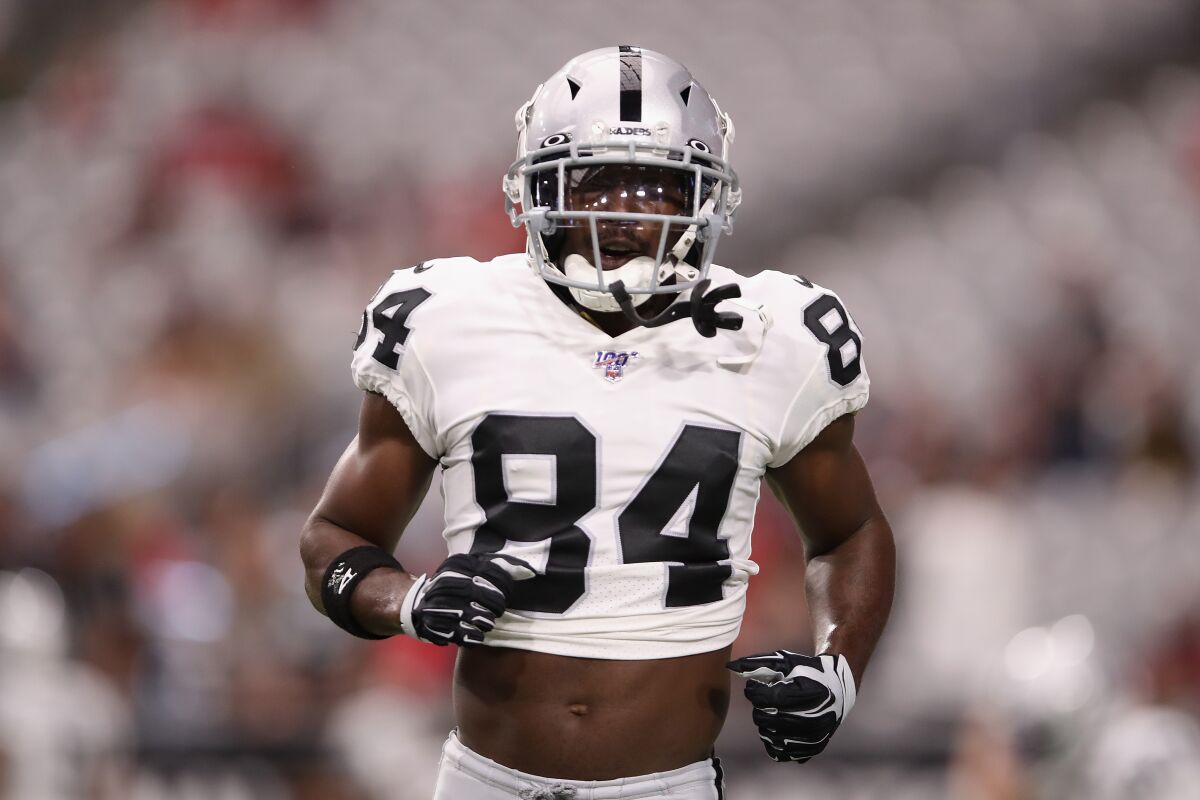 Oakland Raiders receiver Antonio Brown warms up before a preseason game against the Arizona Cardinals on Aug.15.