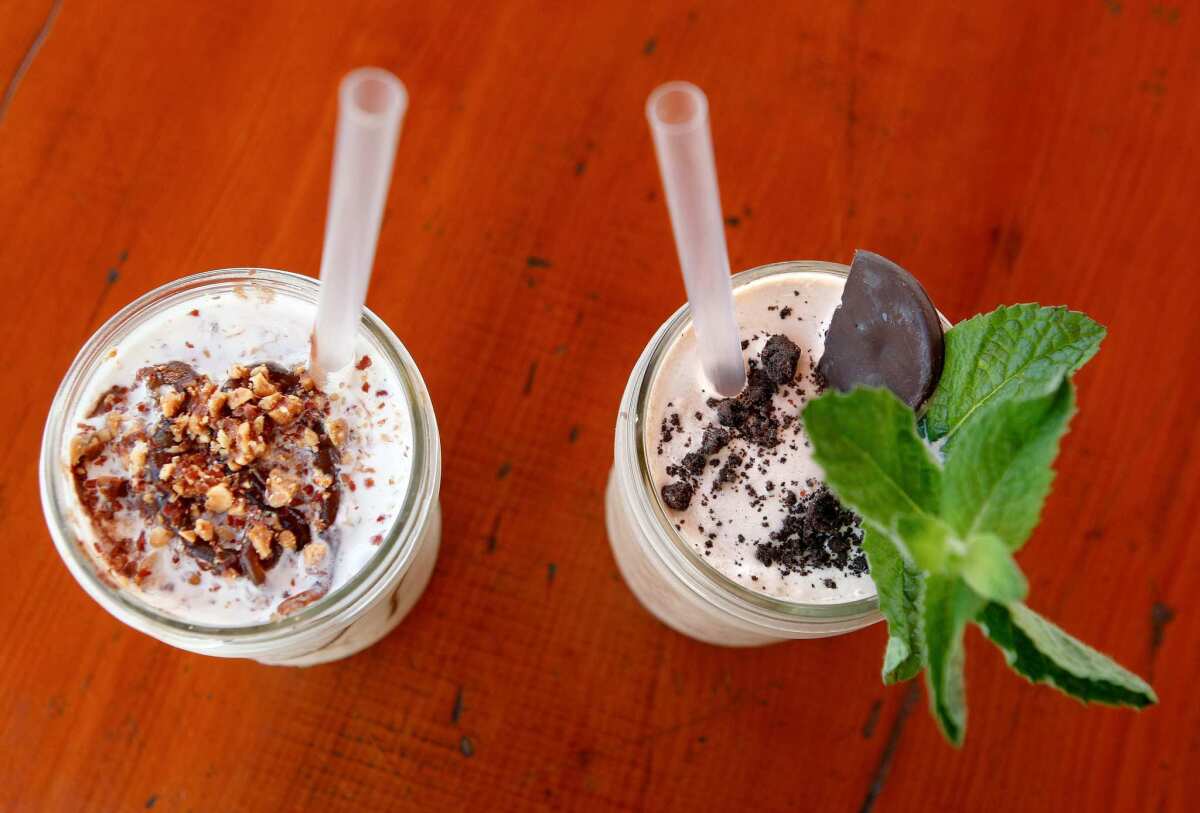 Alcoholic shakes: A Charlie Brown, left, including roasted Spanish peanuts, infused high-proof bourbon, vanilla custard and chocolate ganache, and a Drunken Girl Scout, including Irish whiskey, creme de menthe, Fernet Branca-Menta and chocolate ice cream are two of the alcoholic shakes offered at Short Order at the Original Farmers Market.