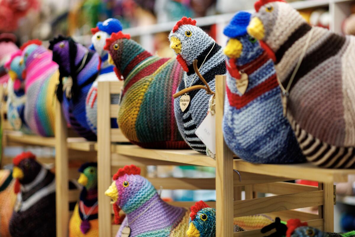 Knitted chickens for emotional support purposes line the shelves at Knitting Tree LA on July 31. 