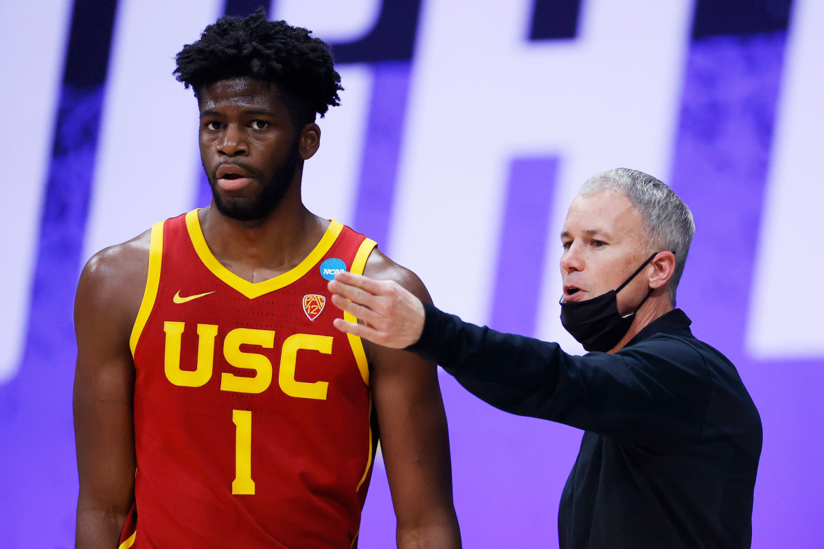 USC's Chevez Goodwin speaks with coach Andy Enfield against Gonzaga.