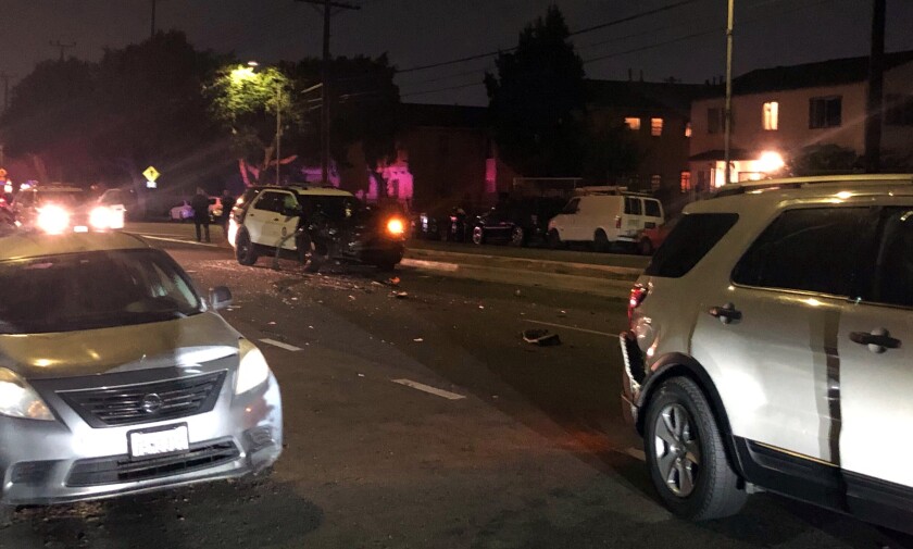 A damaged LAPD SUV at the scene of a crash in South LA.