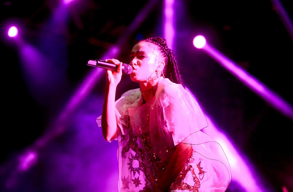 British singer FKA Twigs, a.k.a. Tahliah Barnett, performs on Day 2 of the Coachella Valley Music and Arts Festival.