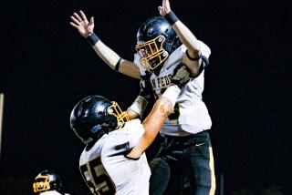 San Pedro players celebrate after scoring a touchdown.