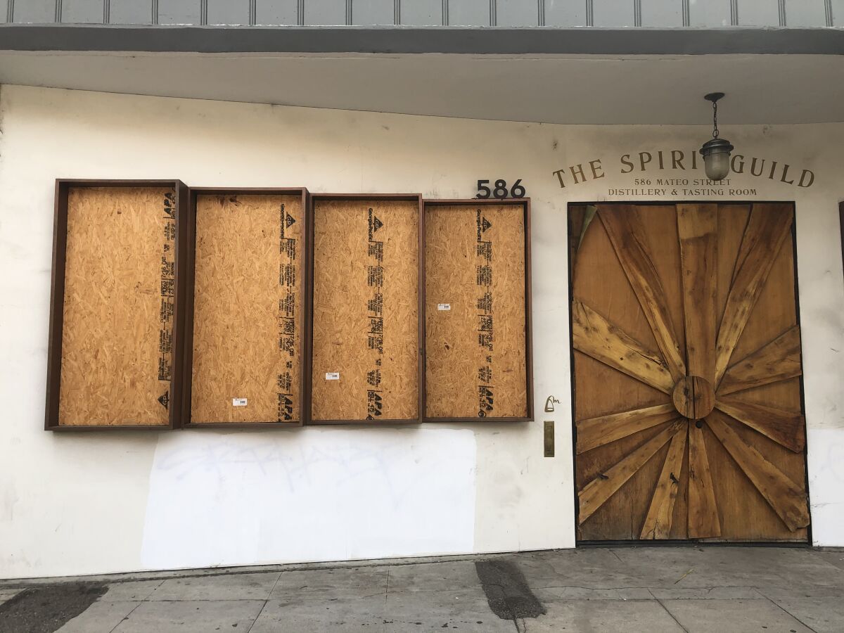 In the Arts District in downtown Los Angeles, some artful plywood barricades on election day.