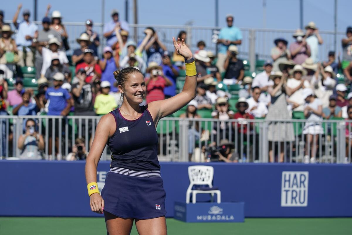 Shelby Rogers, of the United States, waves to the spectators after her 6-3, 6-4 victory against Veronika Kudermetova, of Russia, at the Mubadala Silicon Valley Classic tennis tournament in San Jose, Calif., Saturday, Aug. 6, 2022. (AP Photo/Godofredo A. Vásquez)