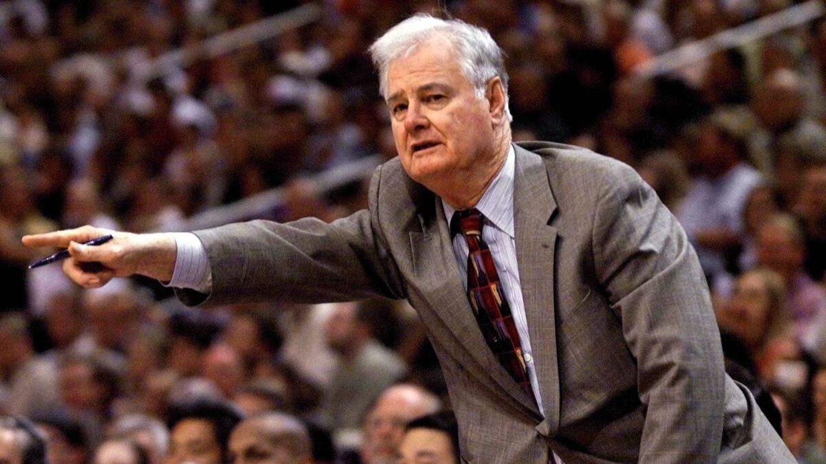 Lakers assistant coach Tex Winter provides advice from the bench on May 12, 2000, during a Western Conference semifinal game against Phoenix.