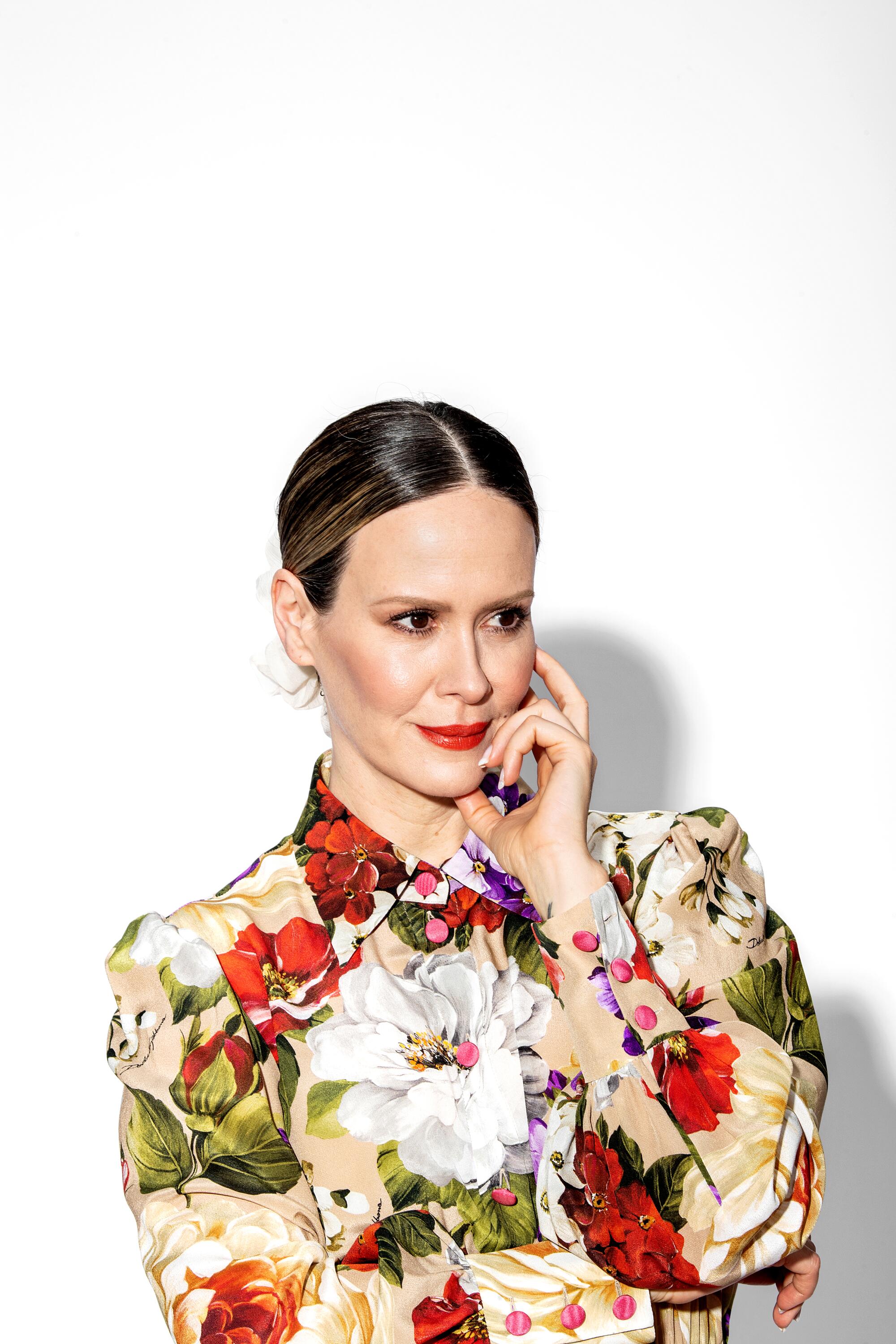 Actor Sarah Paulson in a floral print top