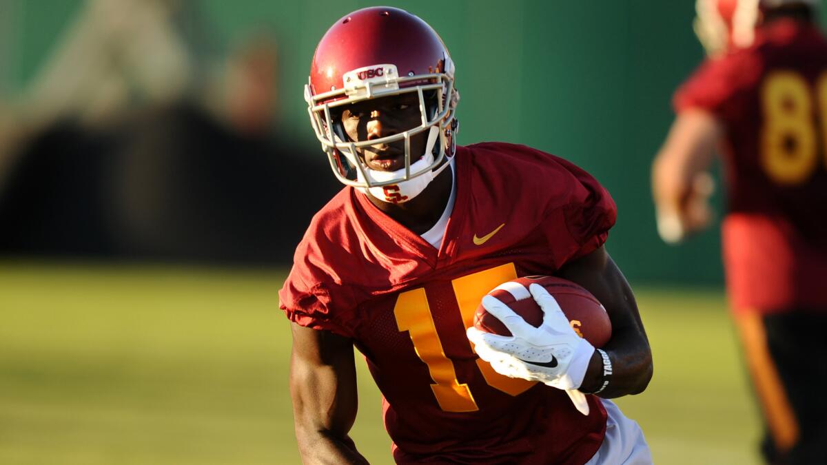 USC wide receiver Nelson Agholor runs with the ball during an Aug. 4 practice session. Agholor is expected to be one of quarterback Cody Kessler's top targets this season.