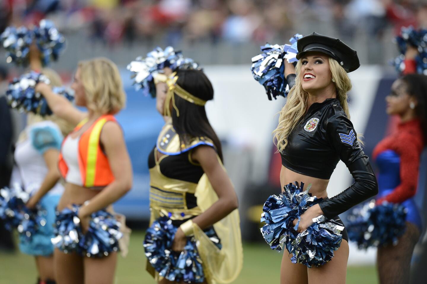 Tennessee Titans cheerleaders perform in Halloween costumes in the second half of an NFL football game between the Titans and the Atlanta Falcons Sunday, Oct. 25, 2015, in Nashville, Tenn. (AP Photo/Mark Zaleski)