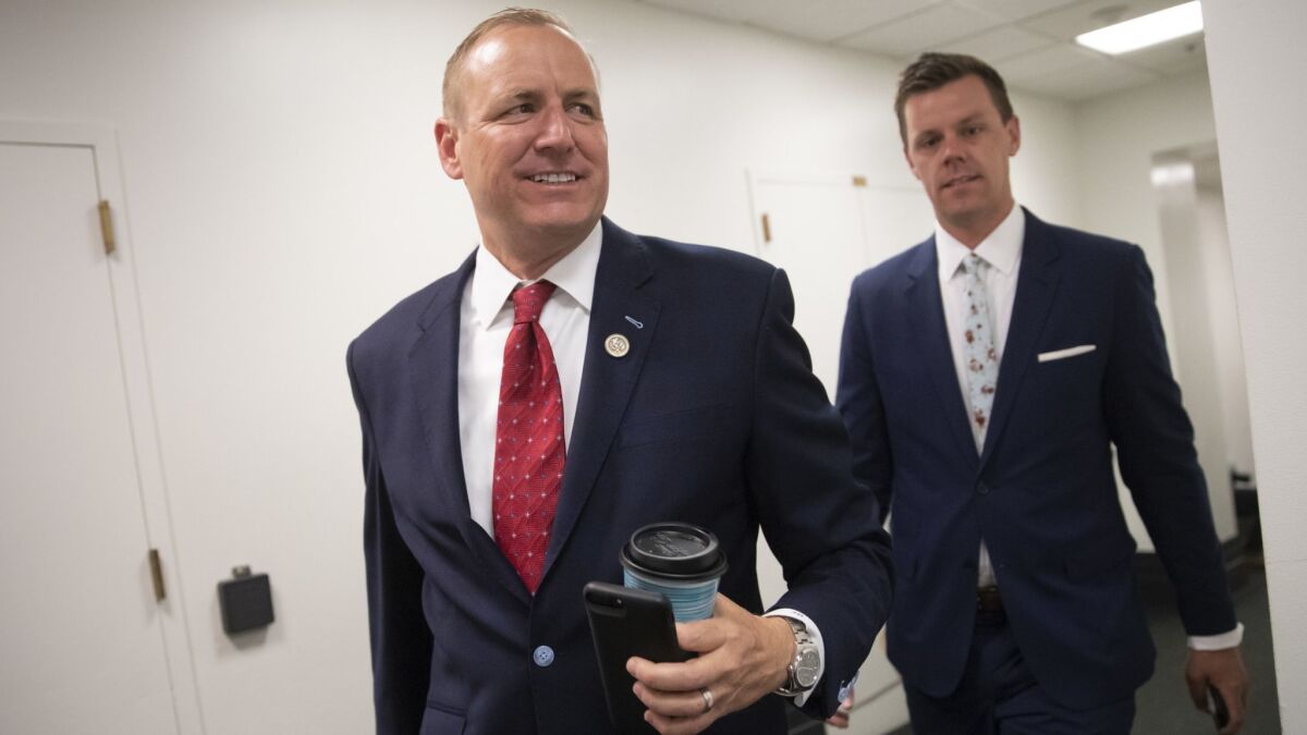 Rep. Jeff Denham (R-Turlock) arrives for a closed-door Republican meeting in the basement of the Capitol as the GOP leadership tries to reach a policy agreement between conservatives and moderates on immigration.