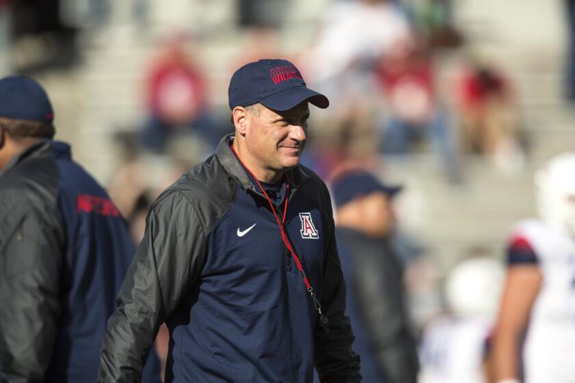 Arizona Coach Rich Rodriguez has led the Wildcats to a 10-2 record this season and a top-10 national ranking.