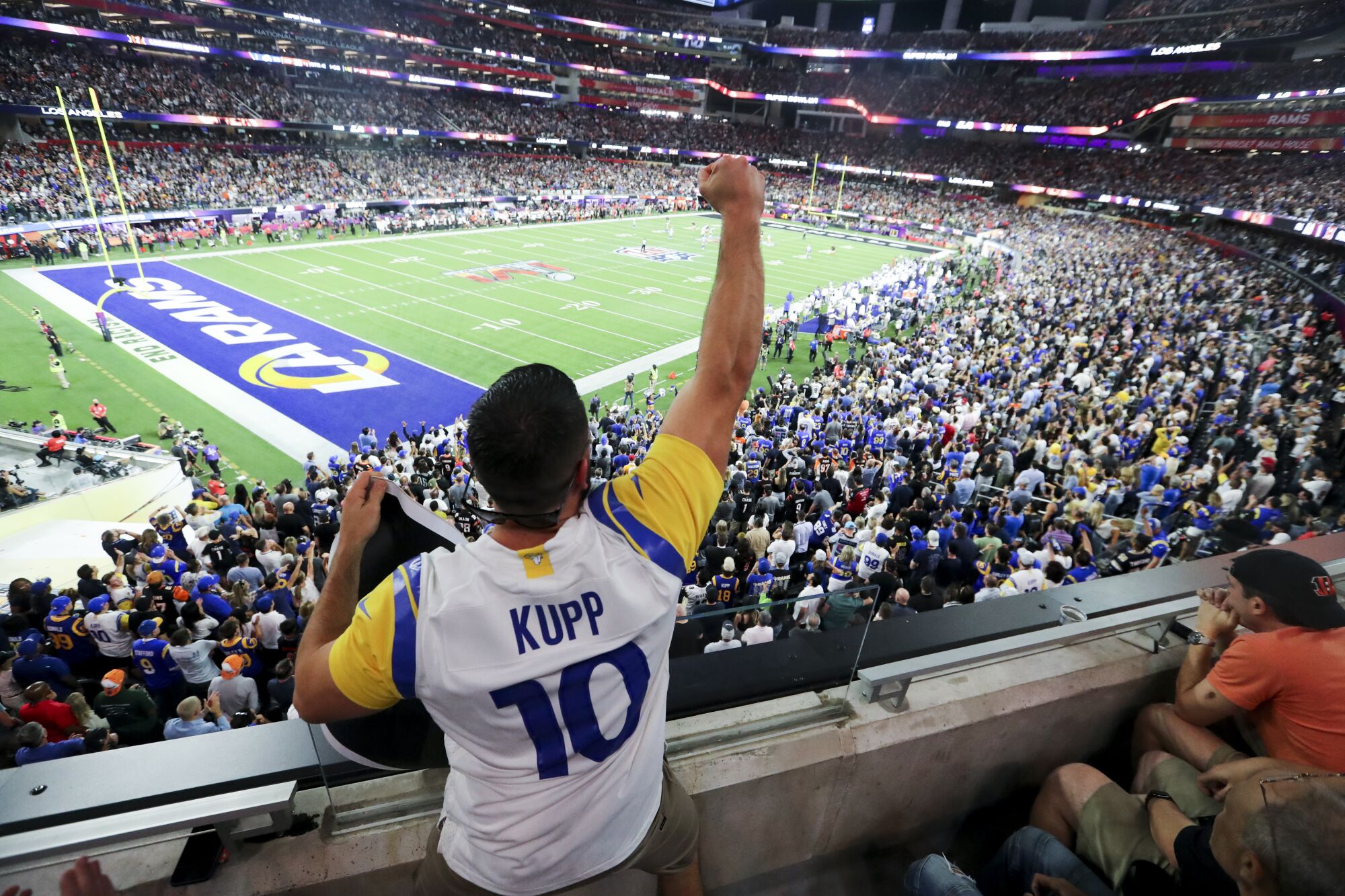A Rams fan cheers during the second half of Super Bowl LVI.