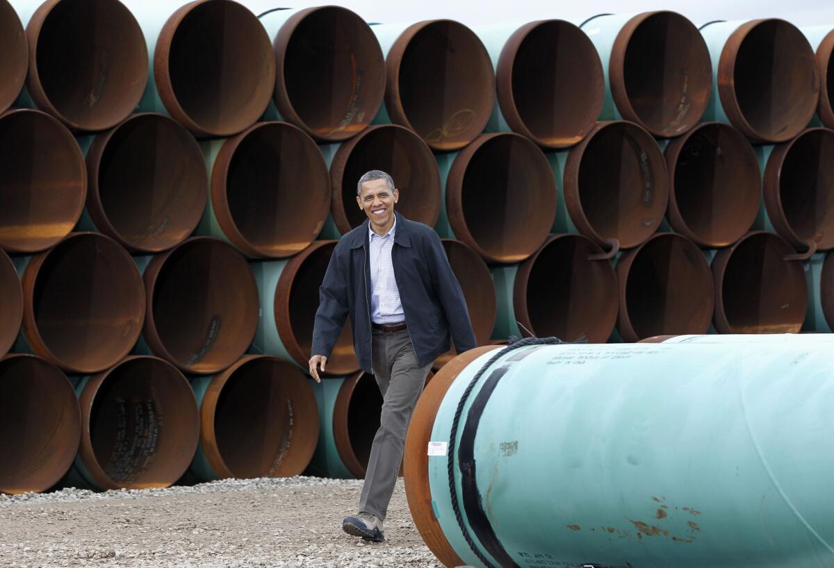 President Obama is seen arriving at the TransCanada Stillwater Pipe Yard in Cushing, Okla. in 2012.