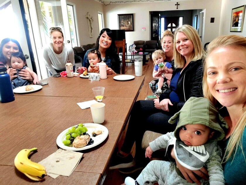 Moms and their babies attending a recent mom’s brunch at St. Brigid.