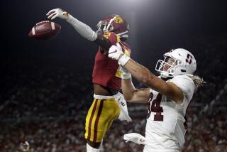 Southern California cornerback Olaijah Griffin, left, breaks up a pass in the end zone intended for Stanford tight end Colby Parkinson during the first half of an NCAA college football game Saturday, Sept. 7, 2019, in Los Angeles. (AP Photo/Marcio Jose Sanchez)