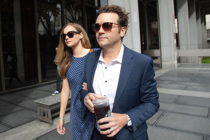 LOS ANGELES, CA - MAY 31: Actor Danny Masterson arrives at Clara Shortridge Foltz Criminal Justice Center in Los Angeles, CA on Wednesday, May 31, 2023 with wife Bijou Phillips for his retrial for allegedly raping three women between 2001 and 2003. (Myung J. Chun / Los Angeles Times)