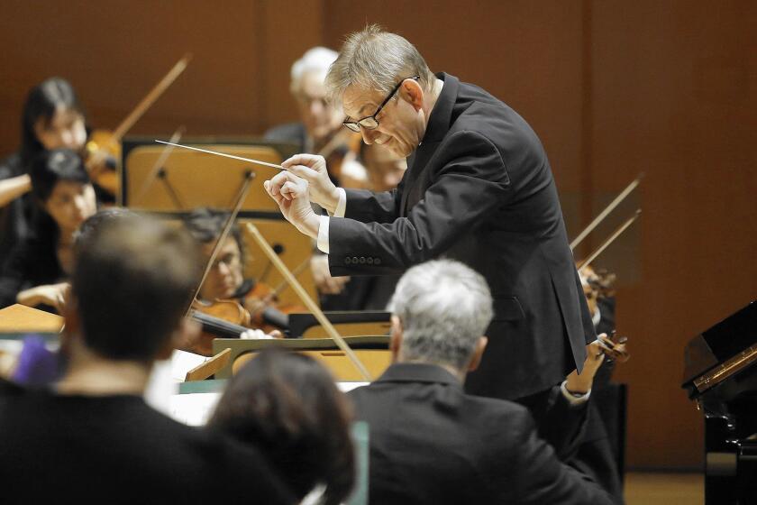 Trevor Pinnock conducts the Los Angeles Philharmonic at Walt Disney Concert Hall on Dec. 19 in Los Angeles.