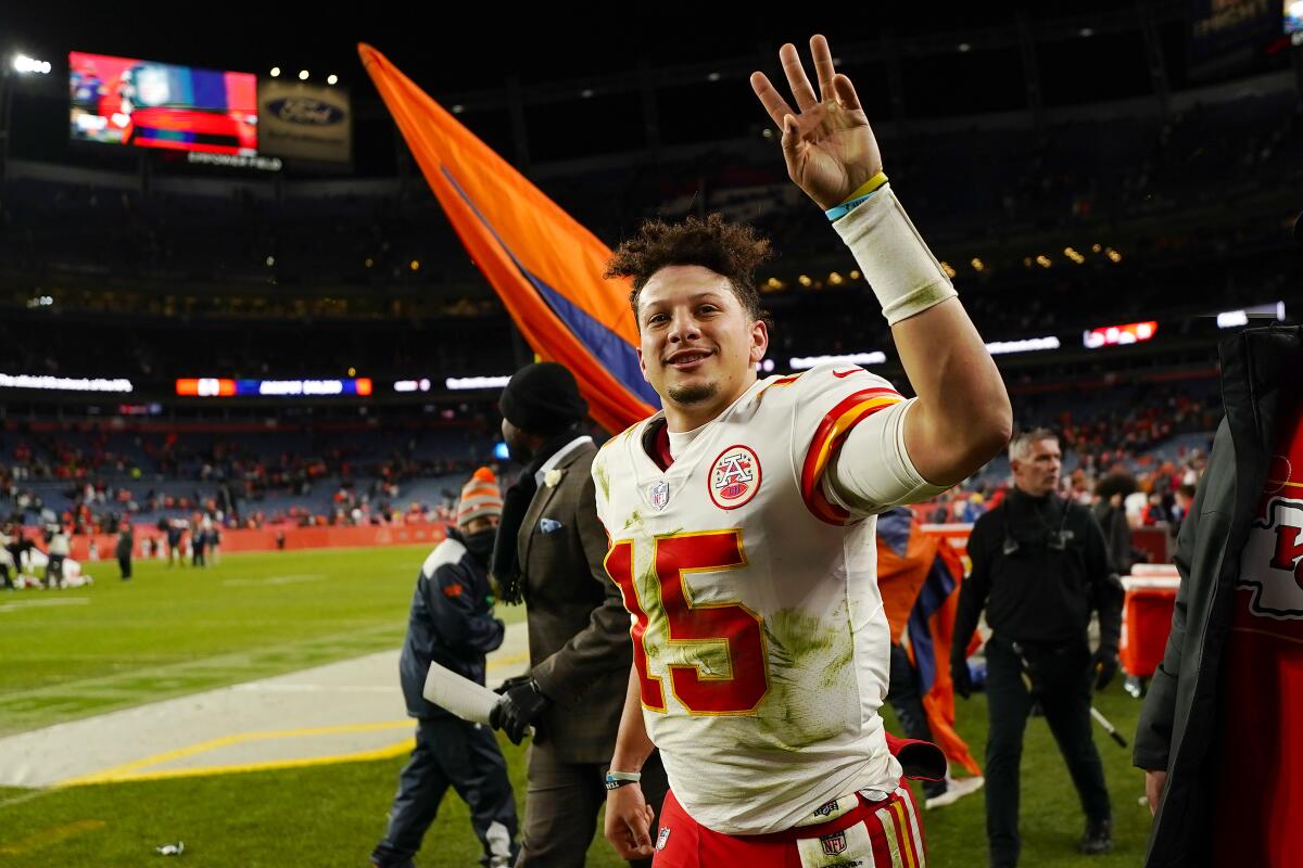 Kansas City Chiefs quarterback Patrick Mahomes (15) waves after the Chiefs defeated the Denver Broncos in an NFL football game Saturday, Jan. 8, 2022, in Denver. (AP Photo/Jack Dempsey)