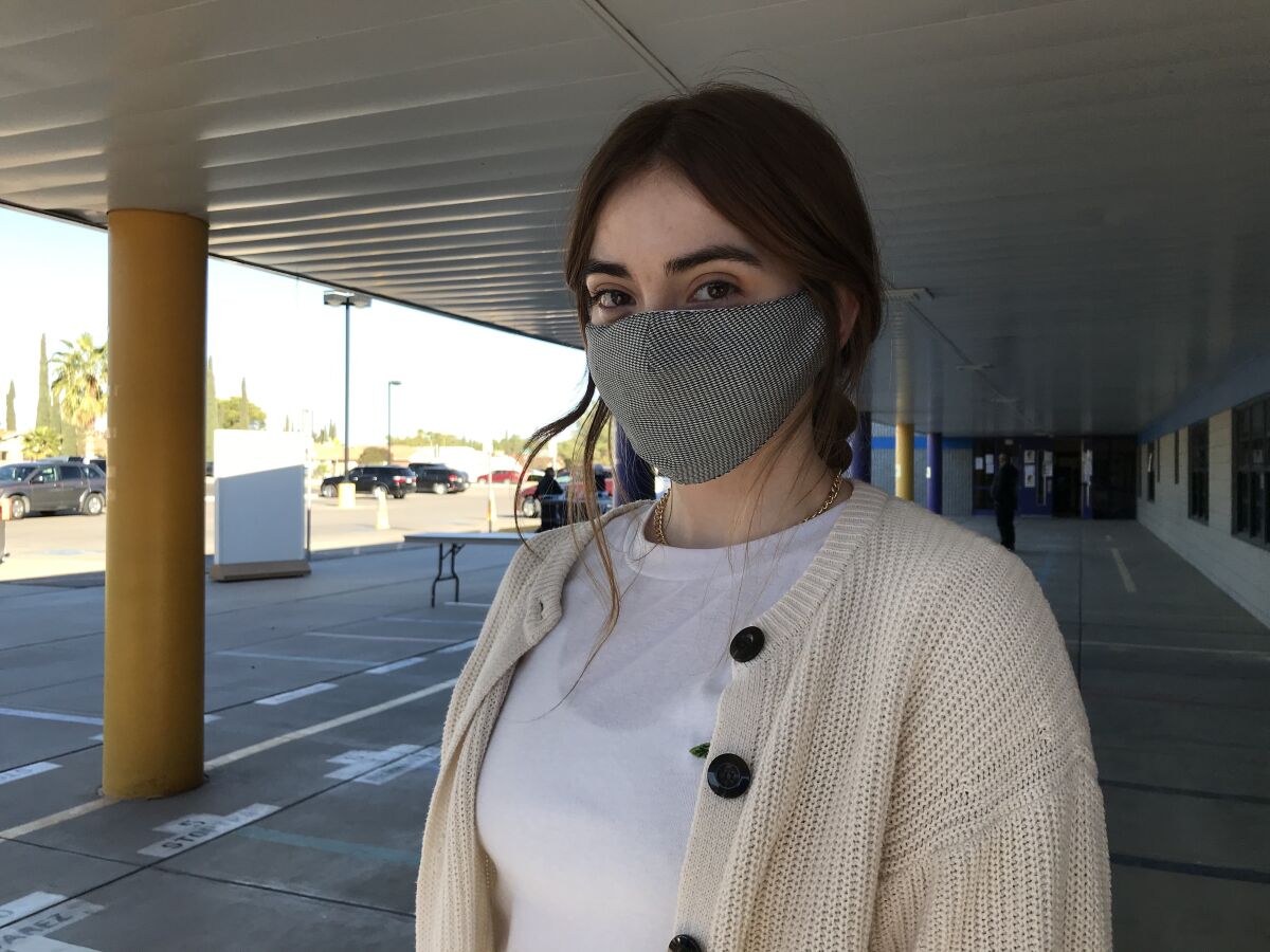 Margaret Cataldi, 20, volunteered at a polling place in El Paso, where she is a student.