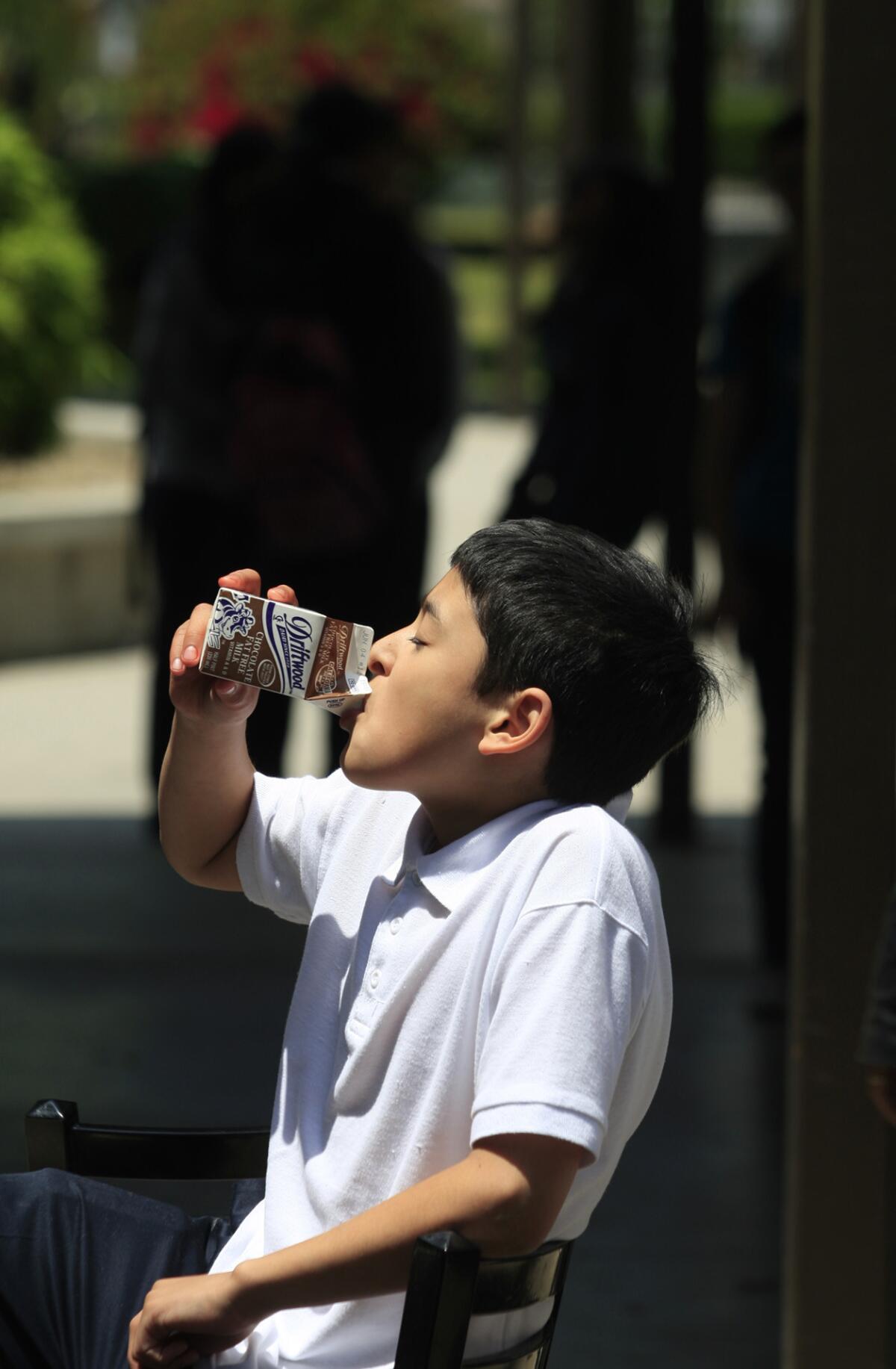 One last quaff? Ivan Ballesteros, 12, a student at Marina Del Rey Middle School, drinks choolate milk during lunchtime in 2011.