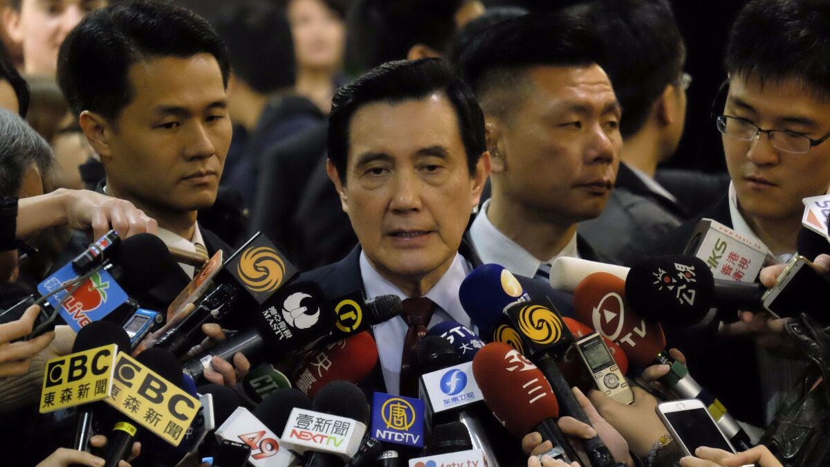 Former Taiwanese President Ma Ying-jeou speaks to the press after a speech to the Harvard College Asia Program in Taipei on March 14, 2017.