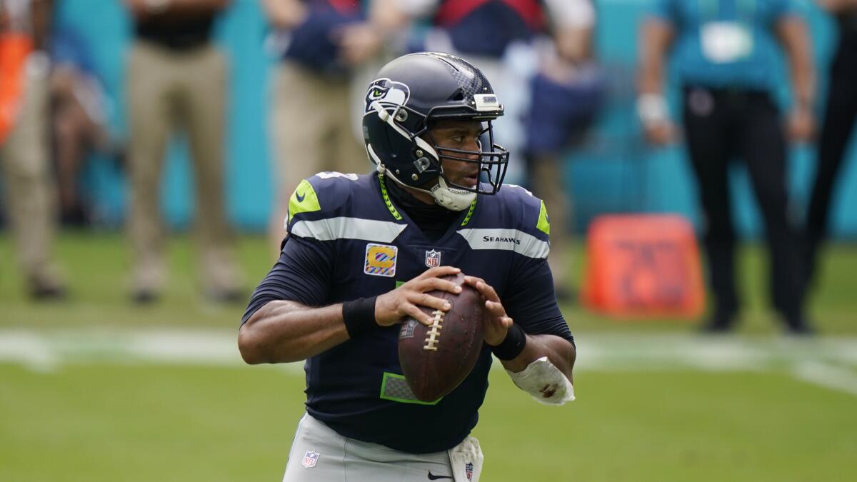 Seattle Seahawks quarterback Russell Wilson looks to pass against the Miami Dolphins on Oct. 4.