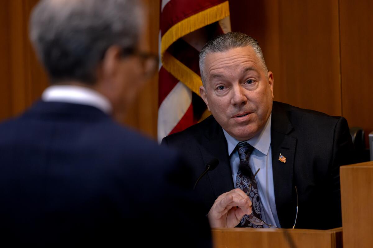 Former L.A. County Sheriff Alex Villanueva testifies about deputy gangs in front of an oversight commission.