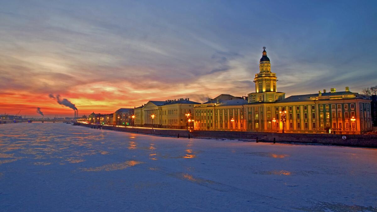 The last light over the partly frozen Neva River falls on the Kunstkamera Museum in St. Petersburg, Russia.