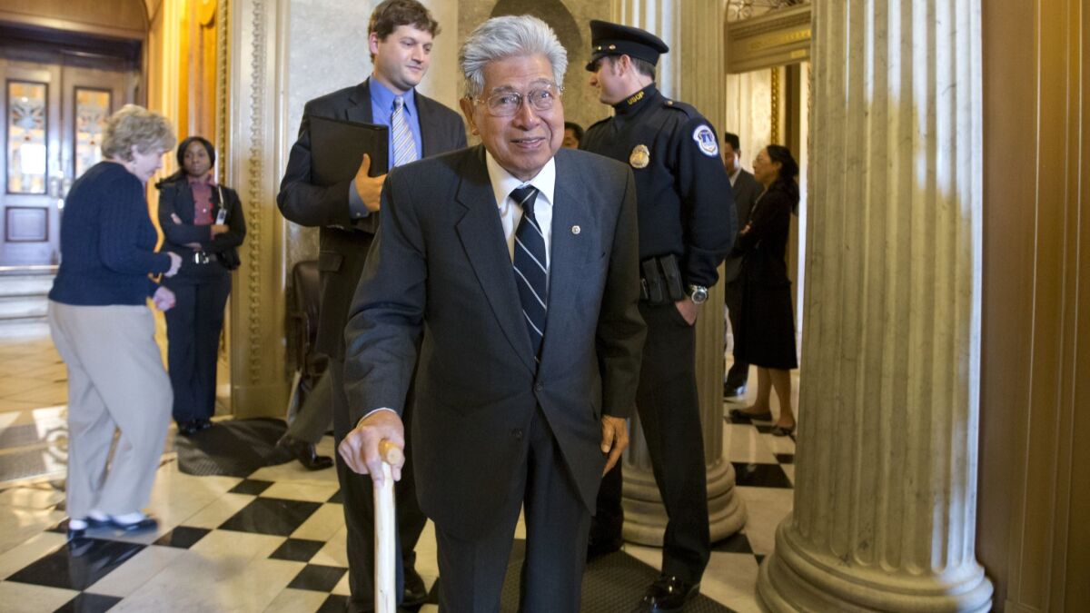 Sen. Daniel Akaka, the first Native Hawaiian to serve in the Senate, leaves the chamber on Capitol Hill in 2012 after delivering his farewell speech.